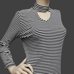 Ladies light mock turtleneck top with cut away.